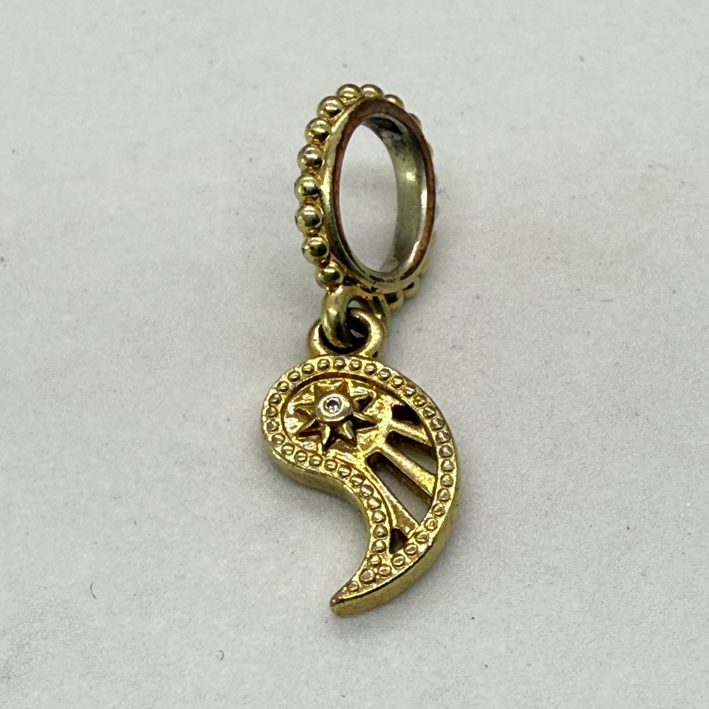 Shine Bright Dangle Charm in Pandora Shine with Star & Sunburst Design